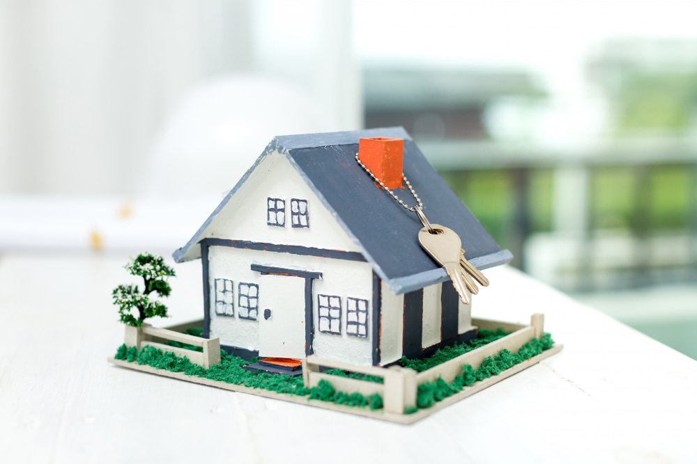 real-estate-with-house-model-keys